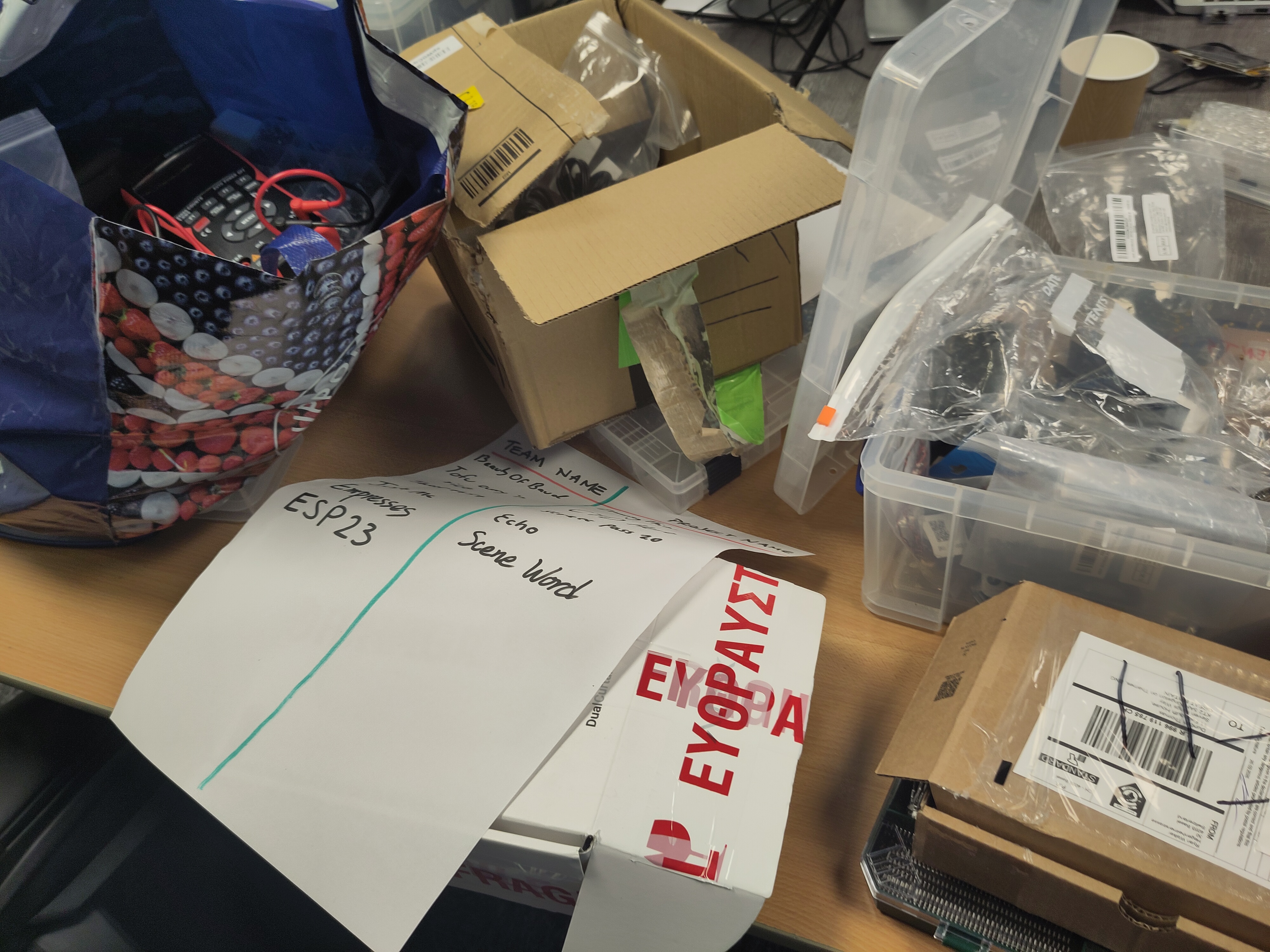 A mess at the hackathon, boxes and paper